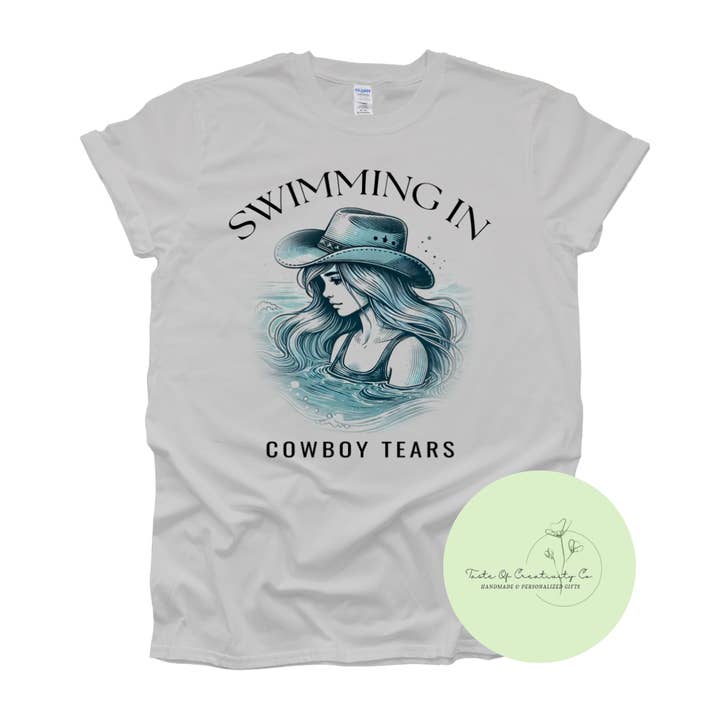 "Swimming In Cowboy Tears" T-shirt, Western T-shirt, Countrykleding, Coastal Cowgirl Collectie, Disco Cowgirl Collectie voor wholesale door Taste of Creativity CO.