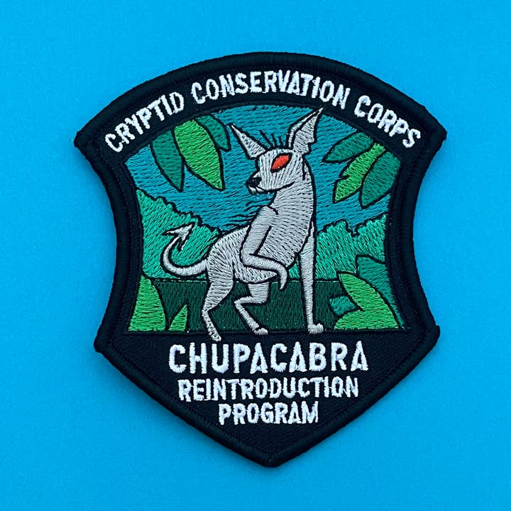 Patch du programme de réintroduction de Chupacabra - Iron-On pour la vente par Dissent Pins