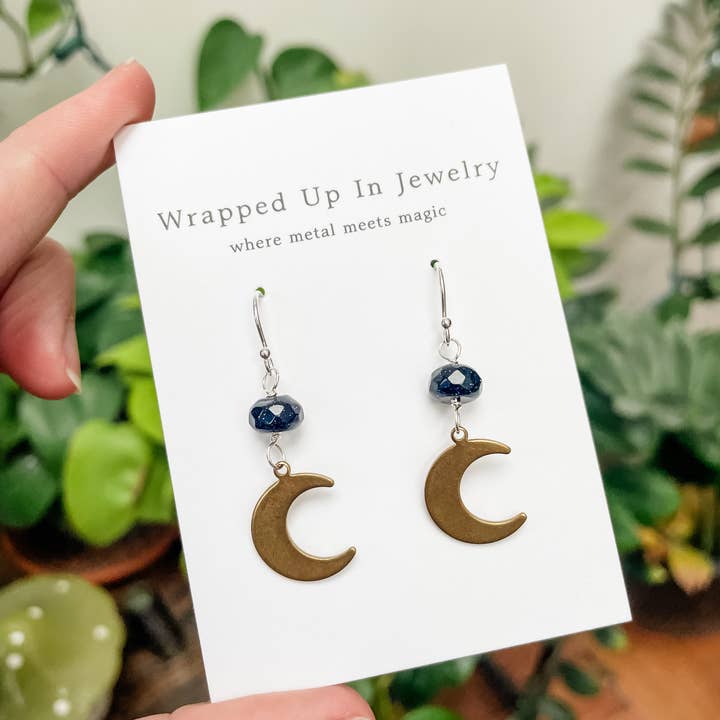 Mixed Metal Crescent Moon Earrings – Blue Goldstone & Silver for wholesale by Wrapped Up In Jewelry