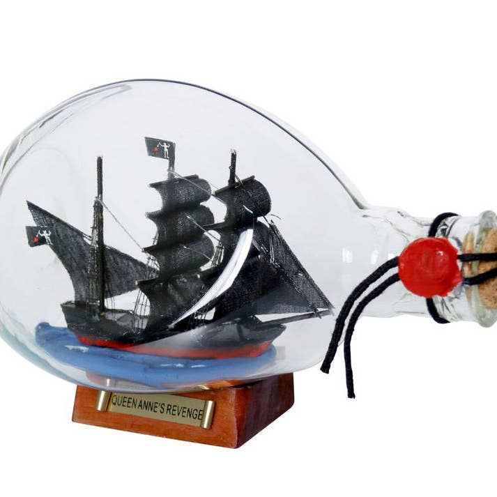 Hampton Nautical – wholesale Decorative tabletop object – Wooden Blackbeard's Queen Anne's Revenge Pirate Ship in a Glass Bottle 7"1