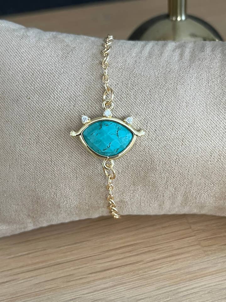 Pulseira dourada EMILE - Olho com pedra turquesa por atacado de Innaya