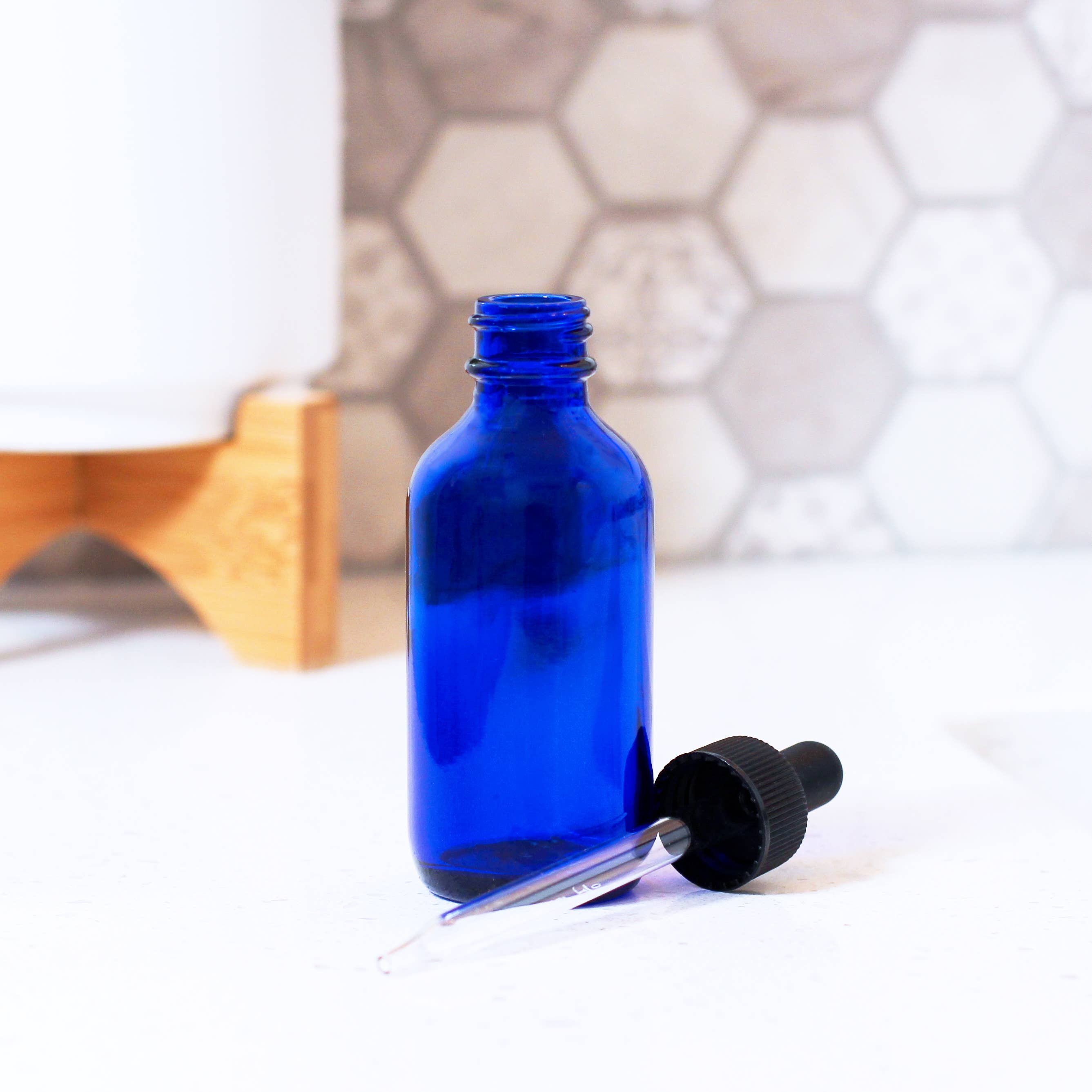 Matrix Aromatherapy - Wholesale Essential Oil Holder - 2oz Empty Blue Glass Dropper Bottle1