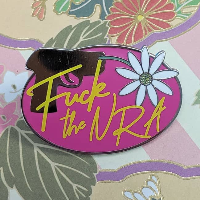 Fuck the NRA hard enamel pin benefiting March for Our Lives for wholesale by Cunning Linguist Co.
