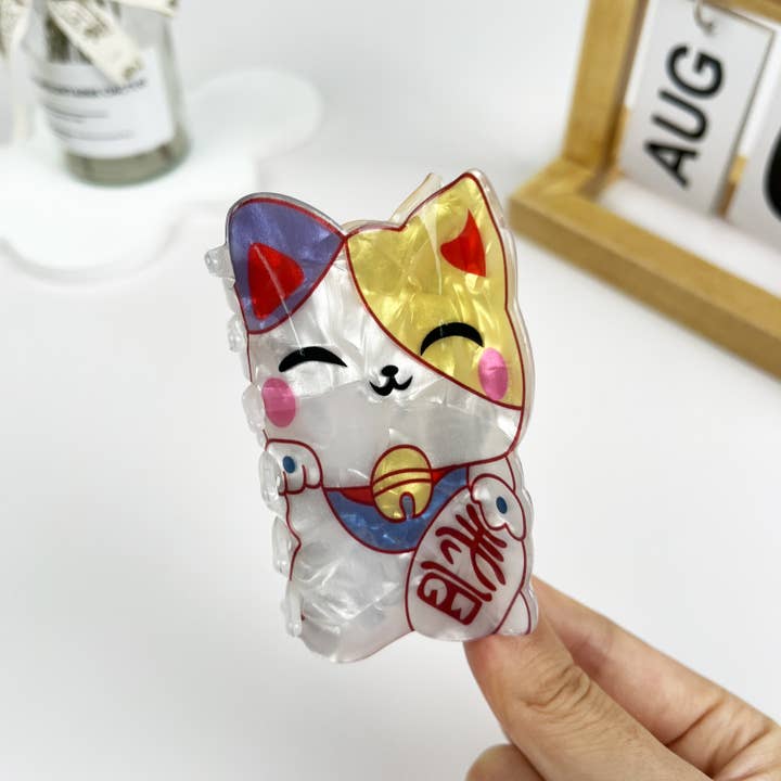 White Japanese Lucky Cat Acrylic Hair Clip for wholesale on Faire3