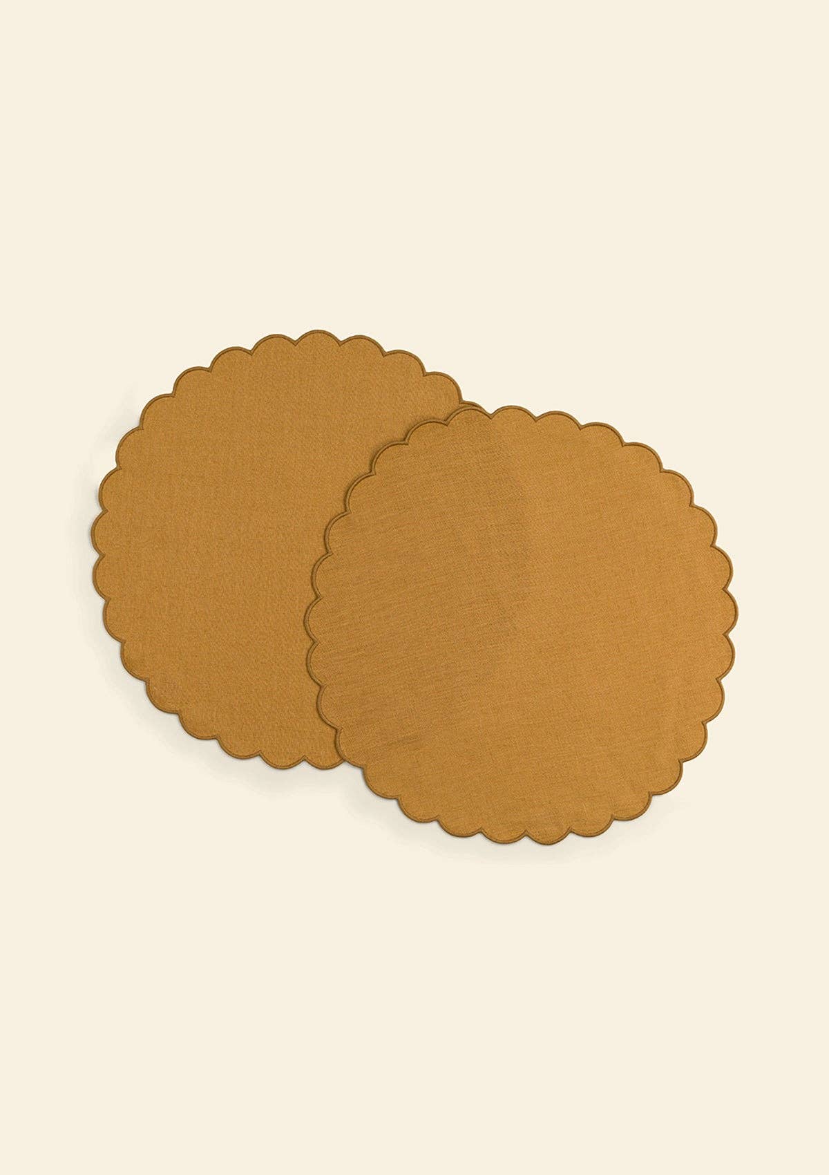 Scalloped round placemats in Ocher yellow linen (set of 2) for wholesale on Faire0