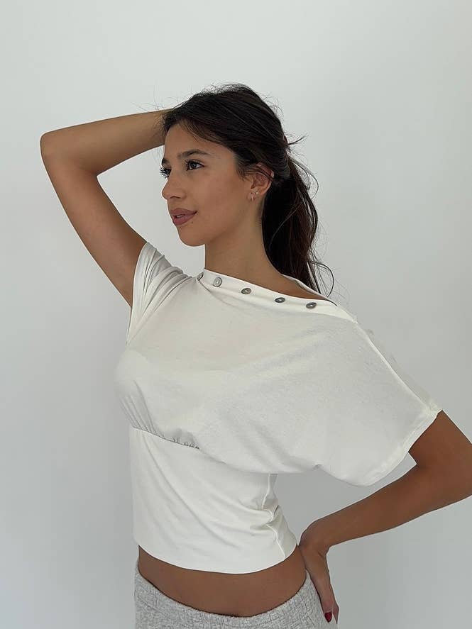 Anna con spalle scoperte e bottoni per la vendita all'ingrosso da parte di MANN ORIGINAL