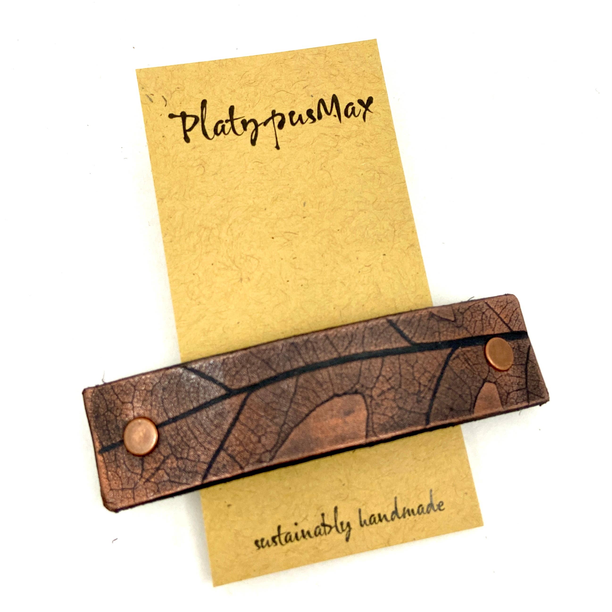 PlatypusMax – Großhandel Haarspange – Damen – Große Haarspange aus bronzefarbenem und schwarzem Leder0