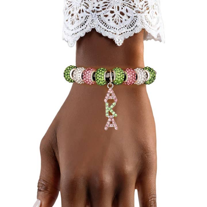 Bracelet jonc câble avec charme grec de la sororité AKA pour la vente par PinktownUSA