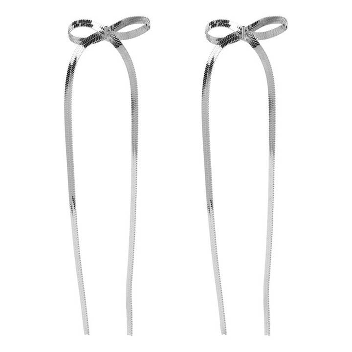 Boucles d'oreilles à nœud papillon pour la vente par Club Manhattan