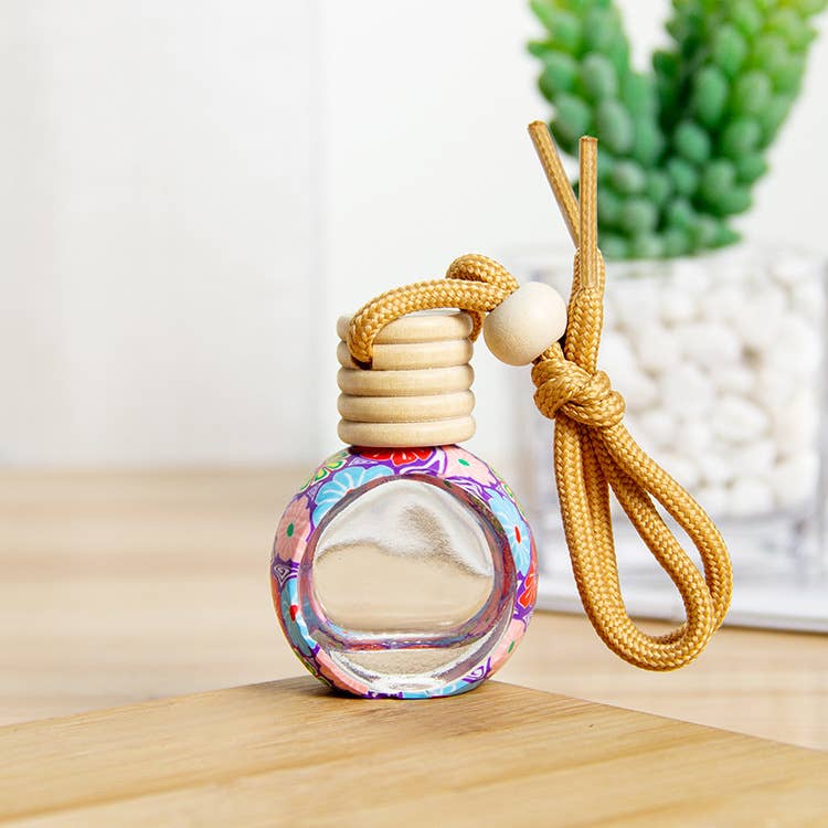 Random Artistic Floral Soft Clay Car Air Freshener Empty Bottle for wholesale on Faire5