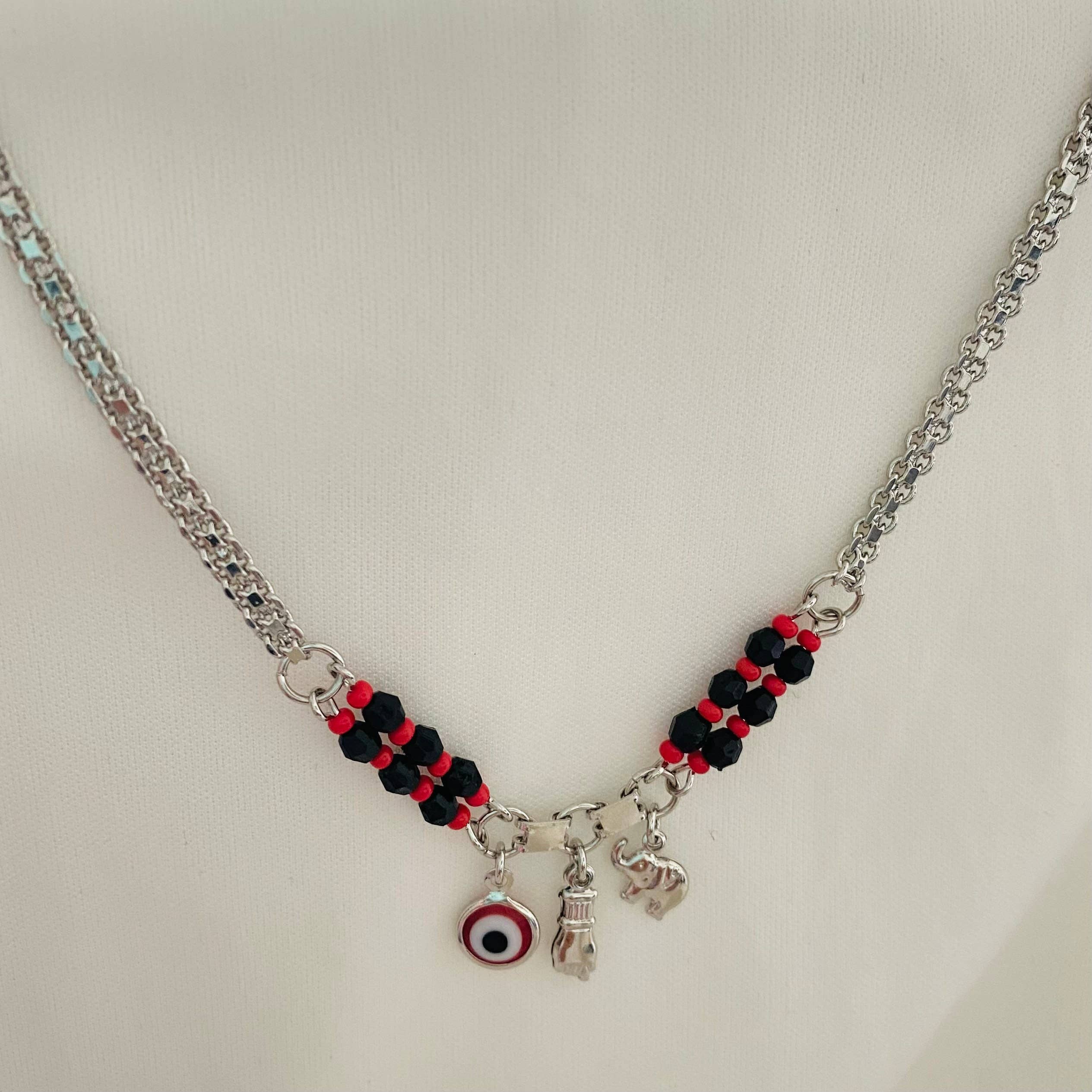 Silver Azabache Choker Necklace, Evil Eye Charm Necklace, Figa Hand for wholesale on Faire2