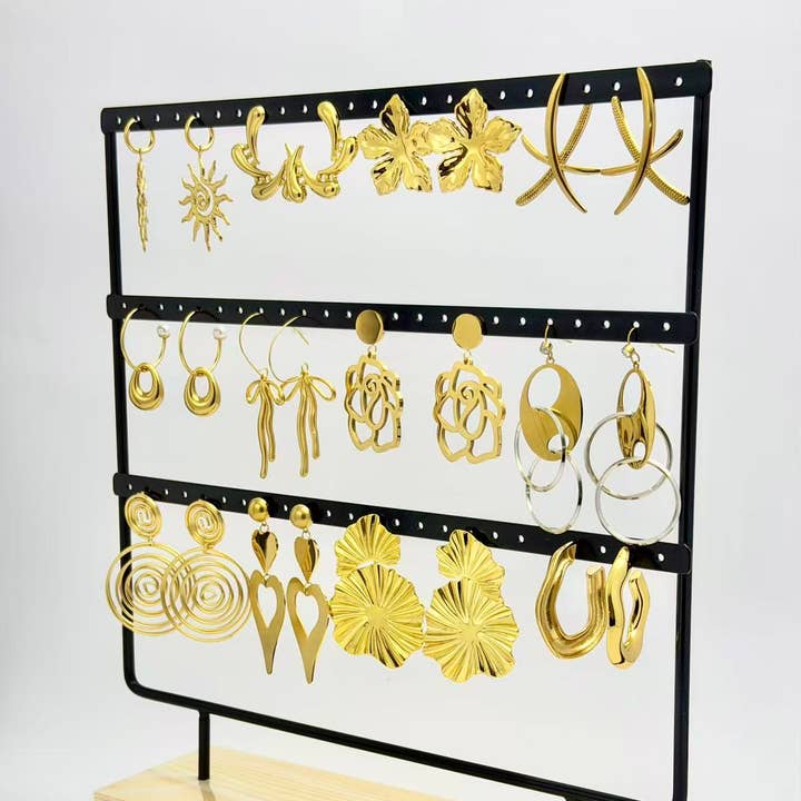 COSMOS - Vendita all'ingrosso Parure di gioielli - Lotto 12 paia di orecchini in acciaio inossidabile su espositore1