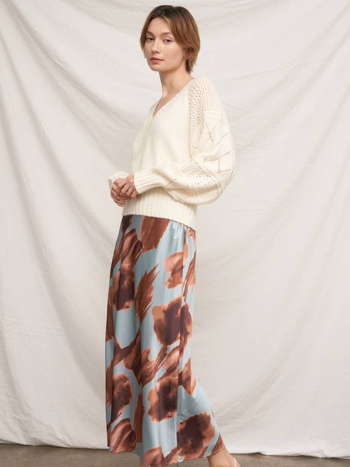 Jupe longue en satin à imprimé floral pour la vente par En Crème