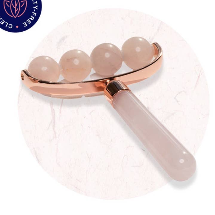 Stress Relief Rose Quartz Roller for wholesale by Caire Beauty