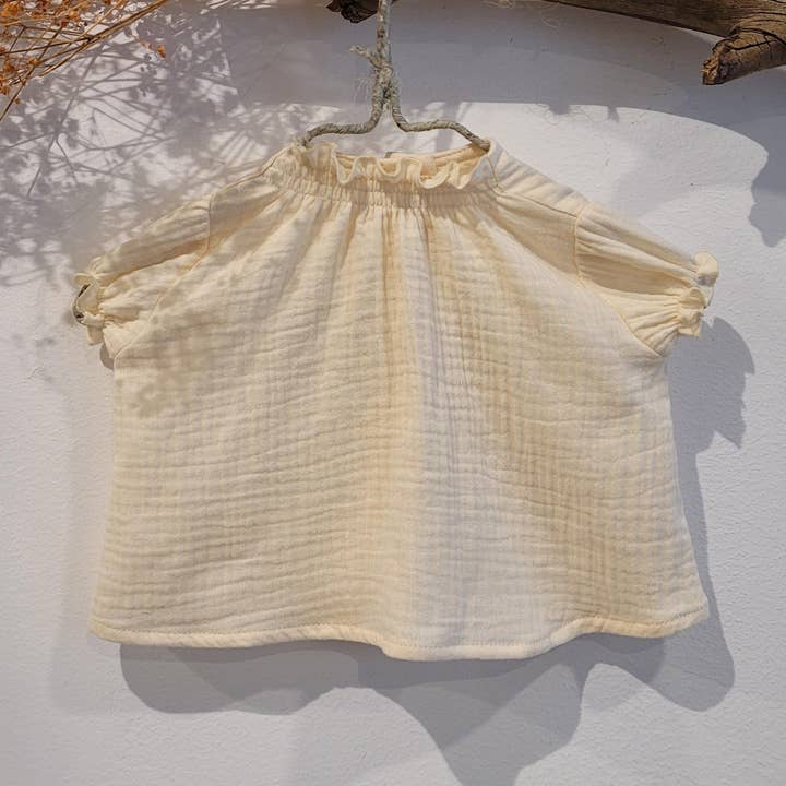 BLOUSE BÉBÉ BAMBOULA BEIGE pour la vente par Mia y Lia
