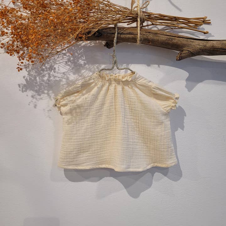 BLOUSE BÉBÉ BAMBOULA BEIGE pour la vente par Mia y Lia