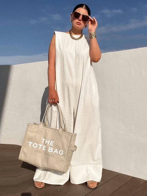 UZ Wholesale Store - Wholesale Jumpsuit - Dames - Mouwloze jumpsuits met wijde pijpen in effen kleur7