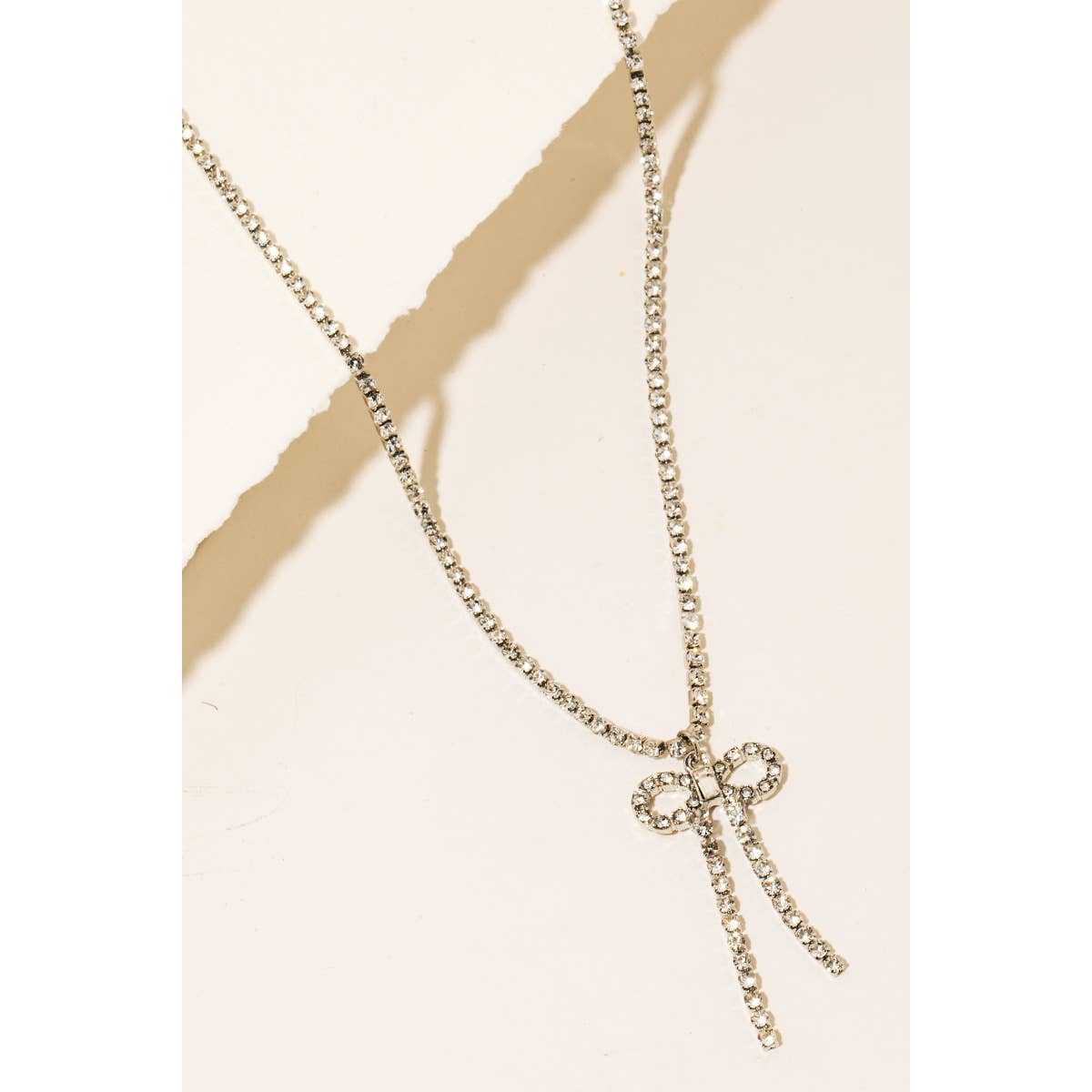 Anarchy Street - Venta al por mayor Collares con colgantes/abalorios - Collar con colgante de cadena y lazo de diamantes de imitación5