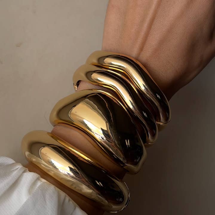 Editorial Hinge Bracelets 14K Gold PVD- Recycled and other Purchase Wholesale hinge. Free Returns & Net 60 Terms on Faire trending on Faire.