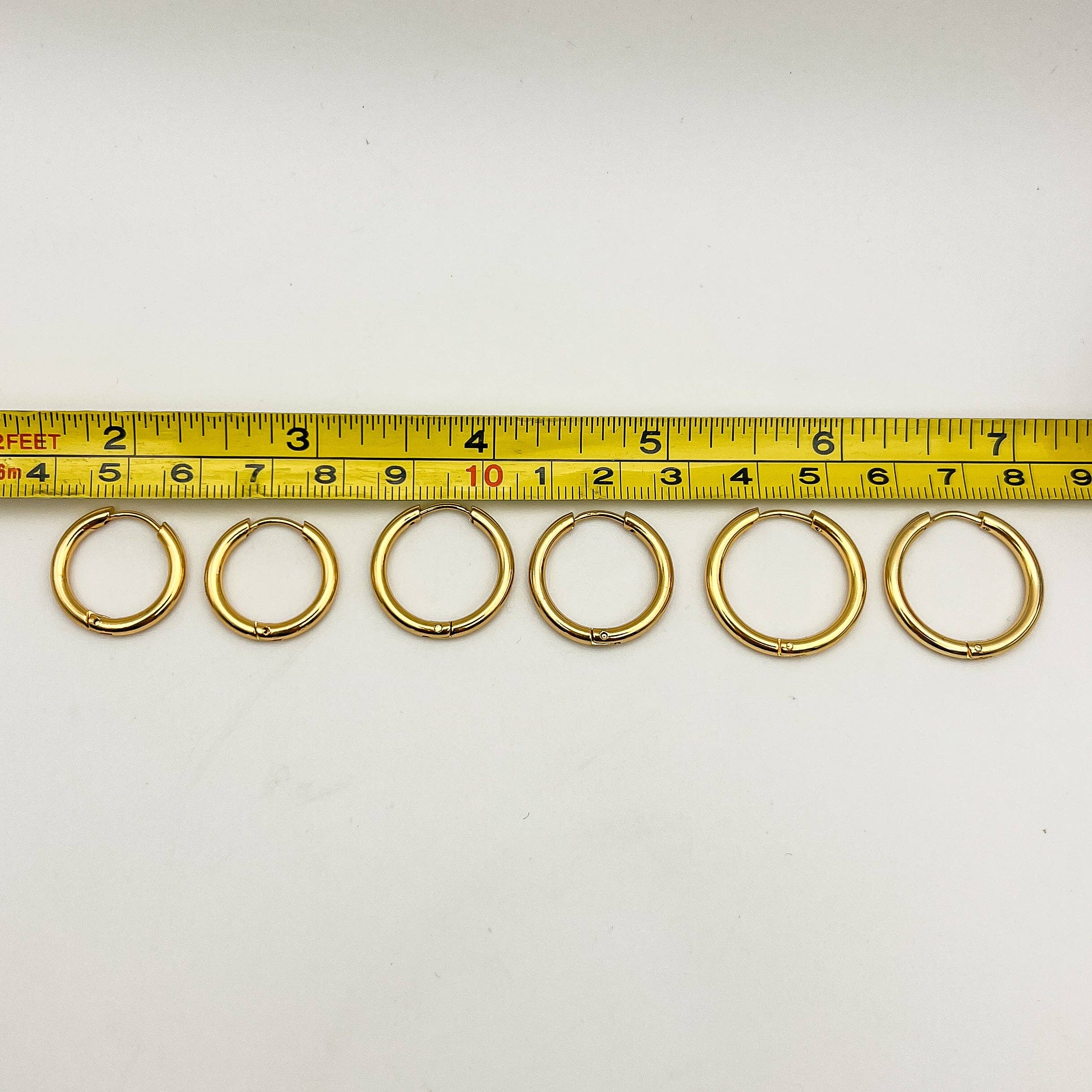 Fiona Grace - Wholesale Jewelry Set - Larger 18k Gold Huggies- Set Of 35