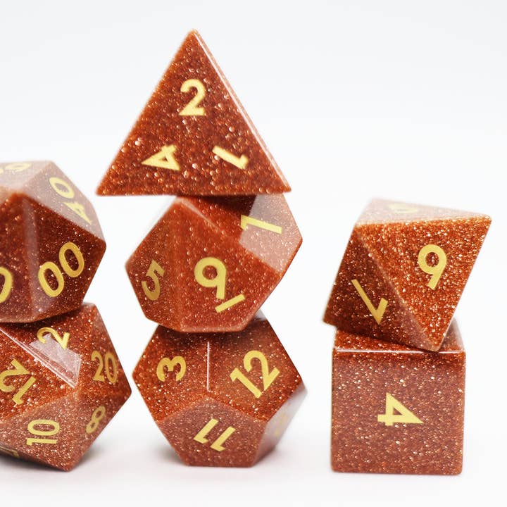 Red Goldstone - Gemstone Engraved with Gold for wholesale by Foam Brain Games