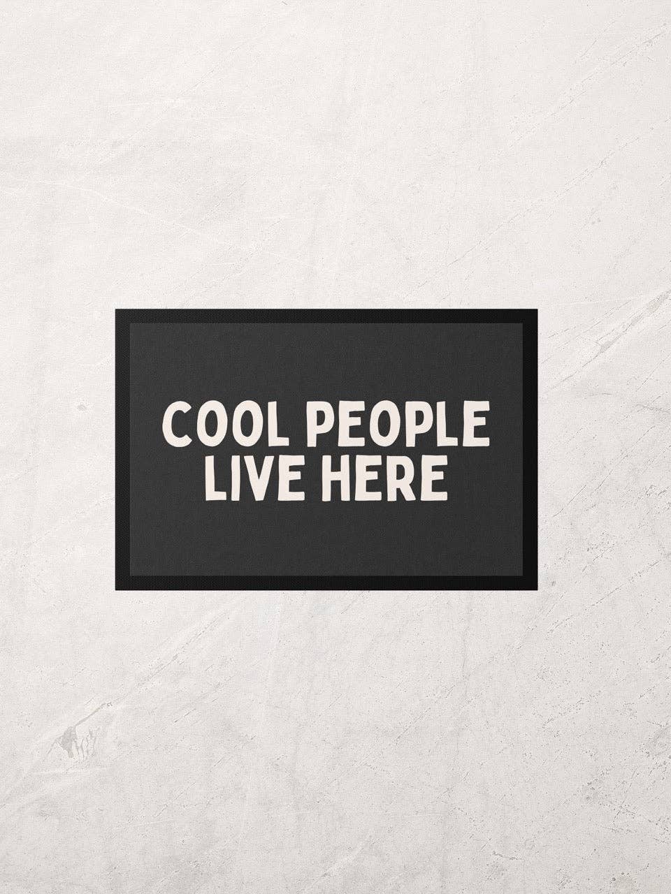 Cool People Live Here | Cream and Charcoal | Indoor Door Mat for wholesale on Faire1