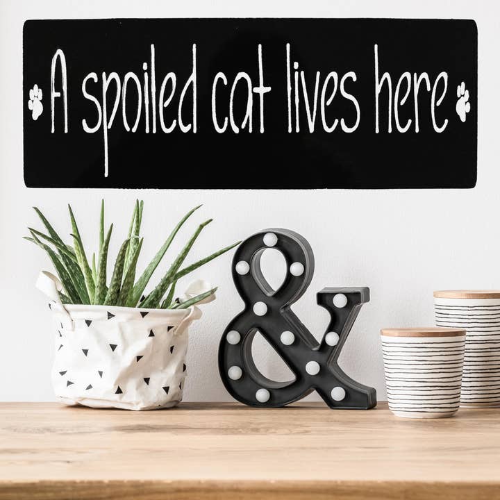 A Spoiled Cat Lives Here for wholesale by White Barn Decor