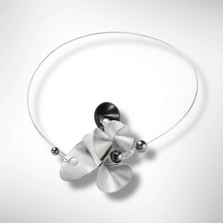 VOLUME 1 3-D Pendant Style Focal Necklace from the SOUND Collection with Recycled Record Vinyl and Simulated Pearls for wholesale by Chick Boss LLC