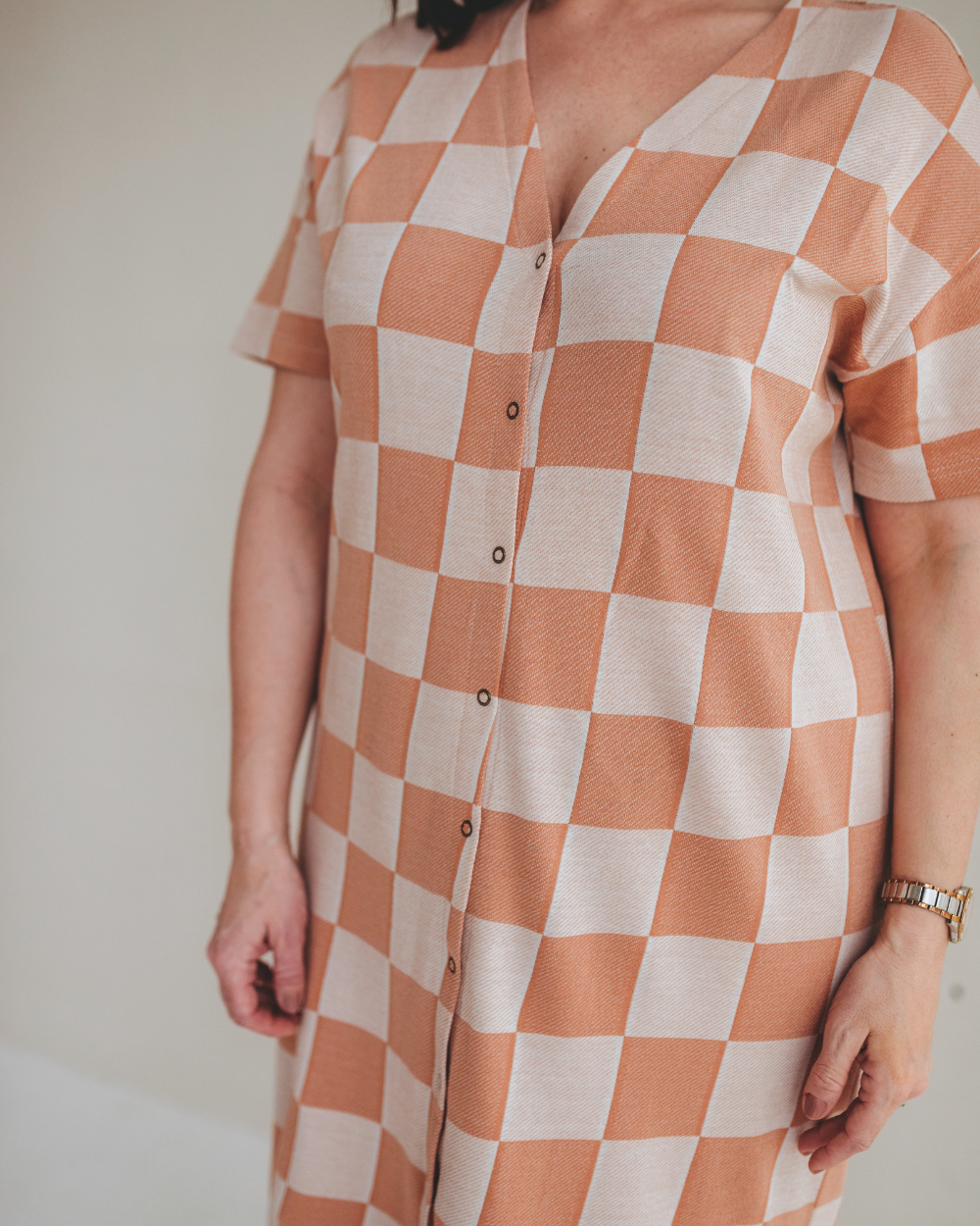 Sunset Eden Orange Bold Check Print Midi Dress for wholesale on Faire5