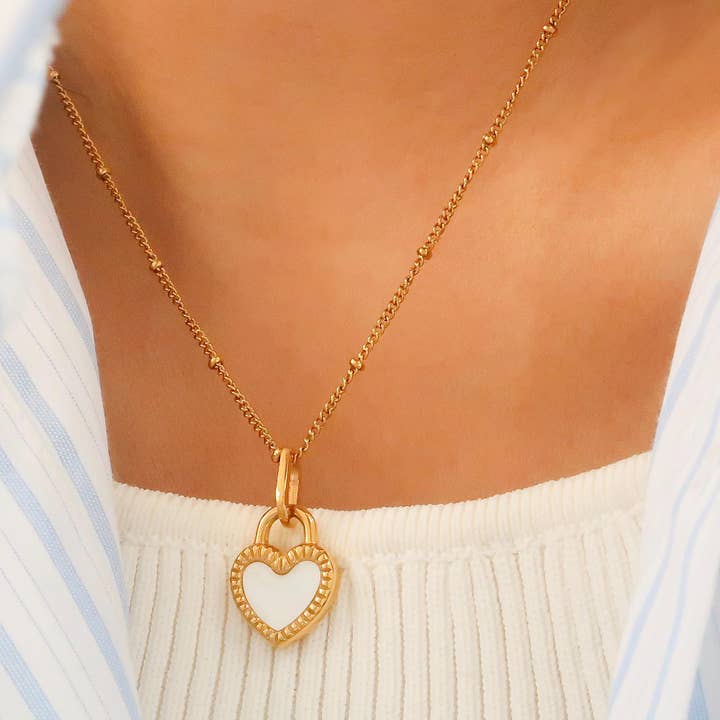 Kylie Non-Tarnish Double-Sided Black & White Heart Necklace for wholesale on Faire