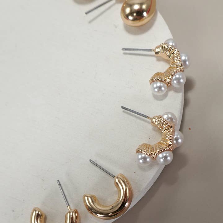 TRIO HUGGIE PEARL GOLD HOOP EARRINGS | 80E5596 for wholesale on Faire