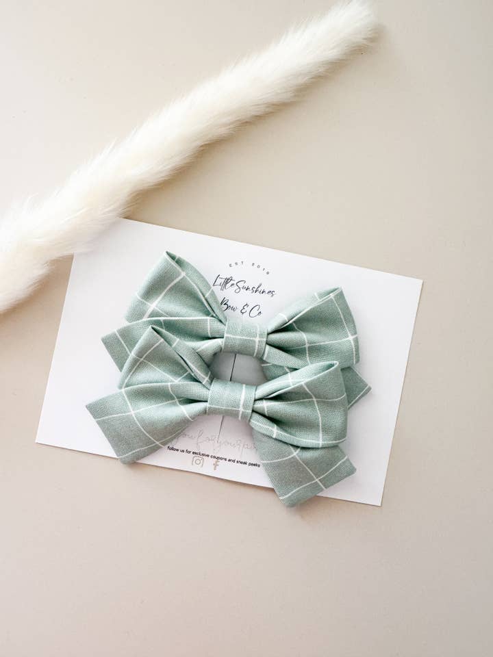Blue Checkered Pinwheel Hair Bow for wholesale by Little Sunshines Bow & Co
