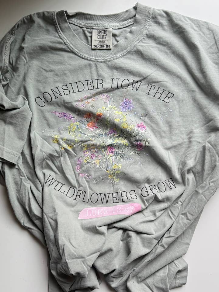 “Consider How The Wildflowers Grow” Graphic for wholesale by Sweet Rae’s Clothing Co.