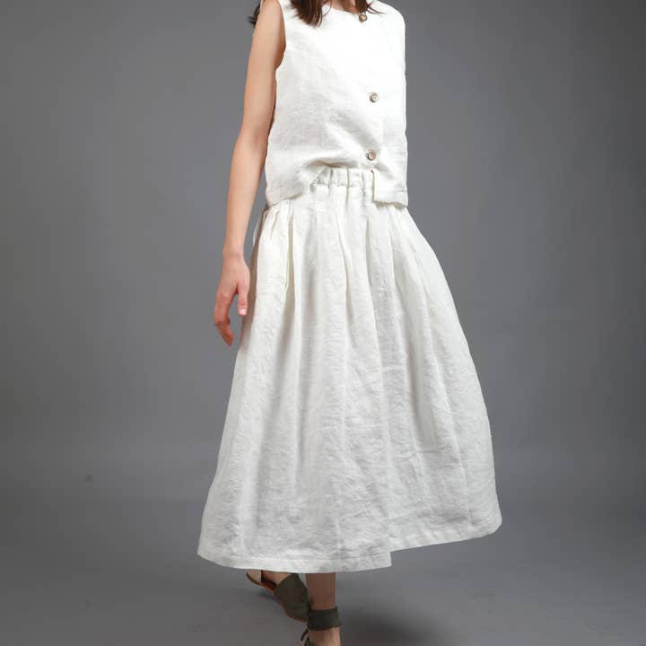 MIMI Voluminous Pleated Midi Skirt with Pockets for wholesale by Knotium