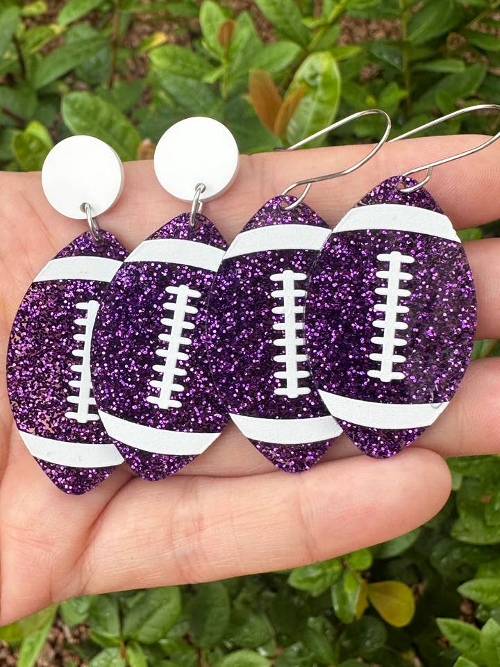 Purple Glitter Football Earrings, Game Day Earrings for wholesale by Laser & Color Designs LLC