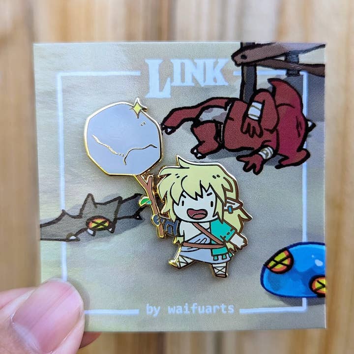 Armed and Dangerous Gold Plated Enamel Pin 1.5 for wholesale by waifuarts