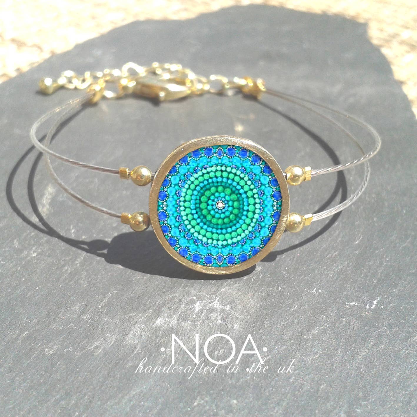 Noa Jewellery – wholesale Charm/dangle bracelet – Round Ceramic Bracelet, Gold Plated Stainless Steel Frame12