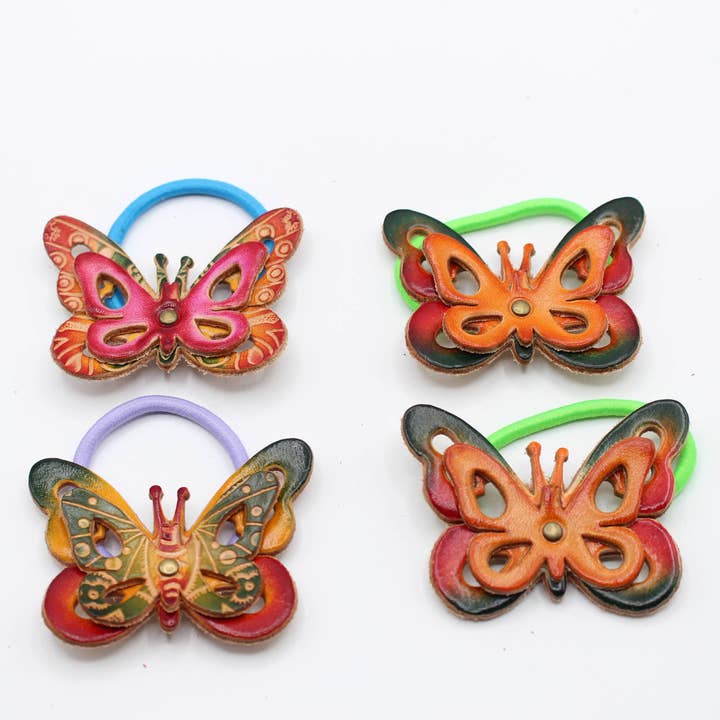 Handmade leather butterfly hair tie for wholesale by Sunflower Handmade leather inc