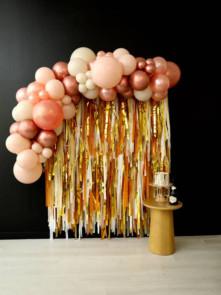 Wonderland Whimsy Fringe Backdrop for wholesale by Oh My Darling Party Co