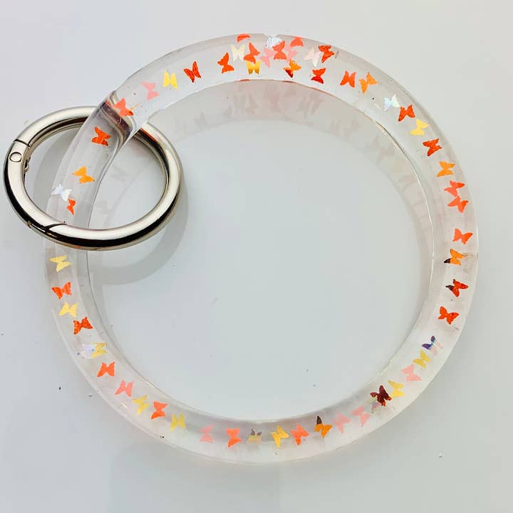 Bracelet jonc porte-clés papillon uniquement pour la vente par Shop Drip Express