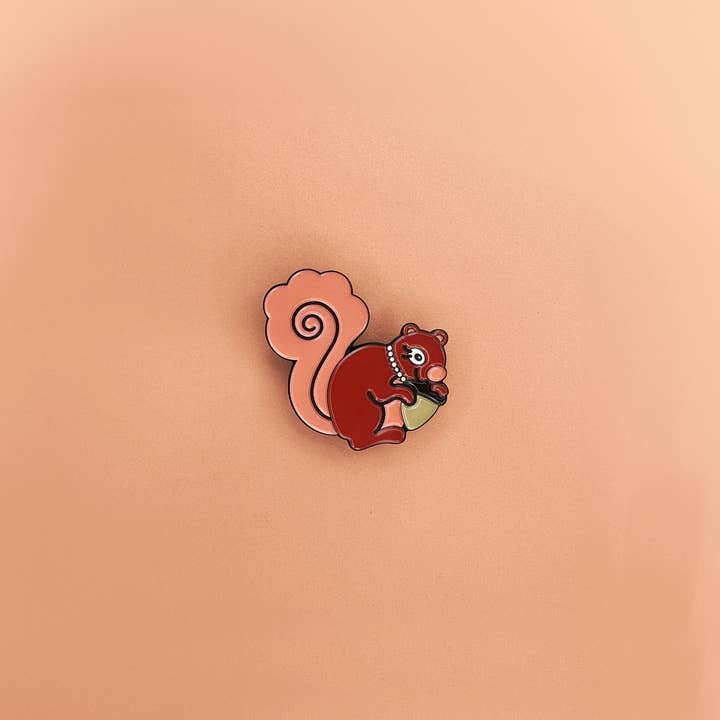 Stash the Squirrel Enamel Pin for wholesale by Forest Crossing Friends