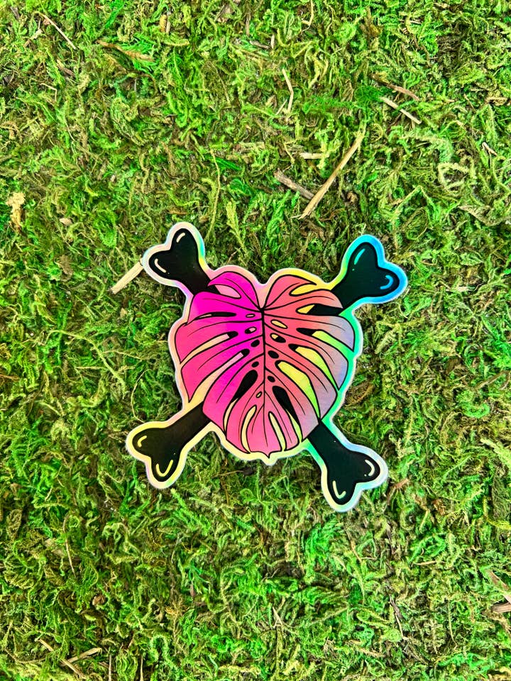 Holographic Punk Rock Monstera Crossbones for wholesale by Clumsy Daisy