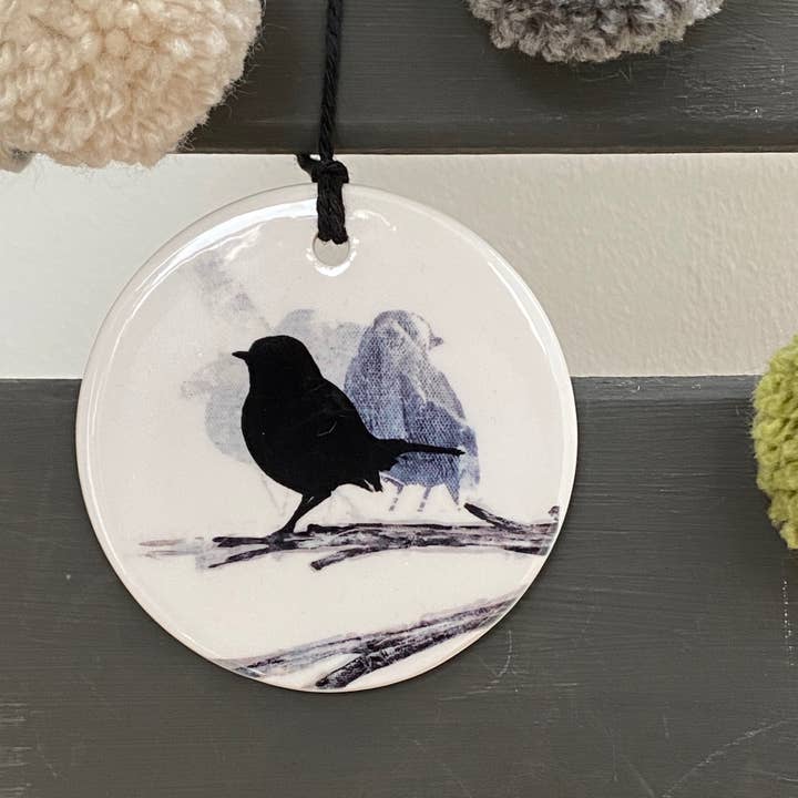 DECORATION: robin on branch for wholesale by Sandra Vick