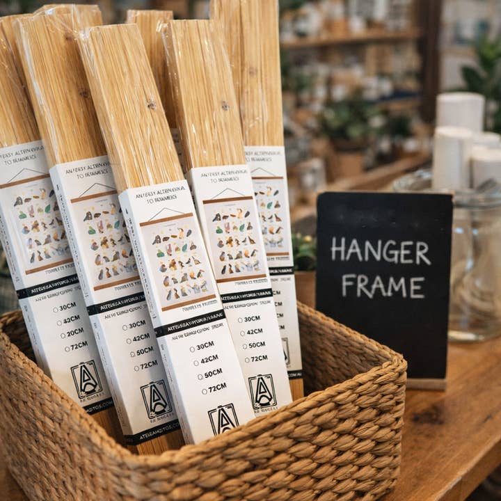 Magnetic Teak Wooded Hanger Frame for wholesale by The Artisan Gift Co.