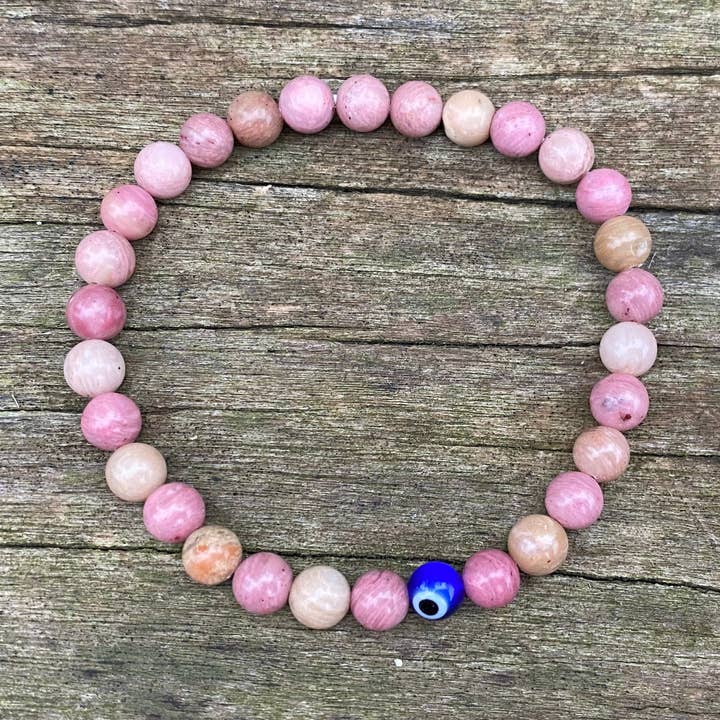 Naturlig Rhodochrosite og Nazar Boncuk tyrkisk øje litoterapi elastisk armbånd for engroshandel hos Boutique Bohème
