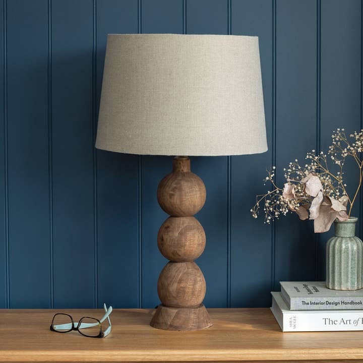 Frampton, Large, Hand-carved Wooden Table Lamp with Beige Linen Shade for wholesale by Arthur Cameron