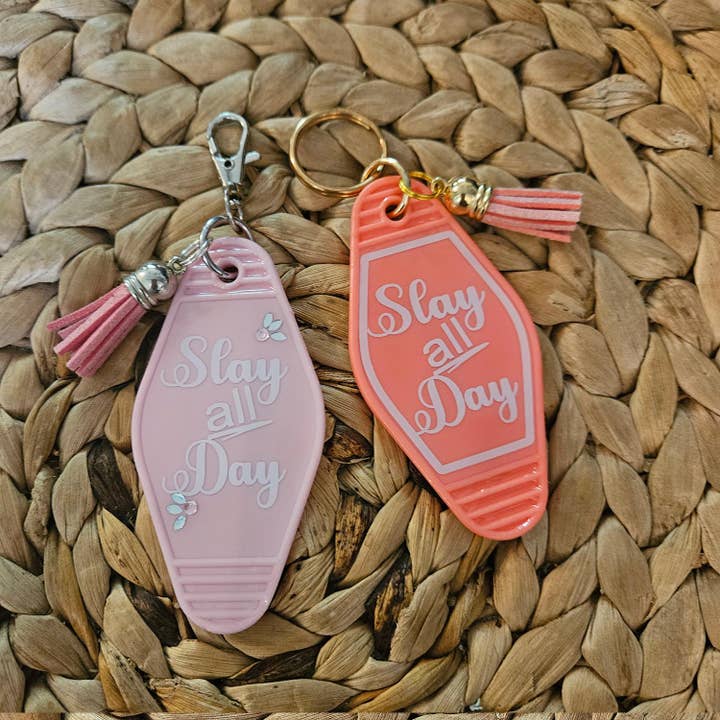 Slay All Day Motel Keychain: 3D Printed Pink Bag Charm and other Purchase Wholesale 3d printed keychain. Free Returns & Net 60 Terms on Faire trending on Faire.