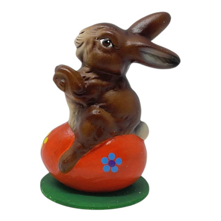Pinnacle Peak Trading - Wholesale Decorative Figurine - Ino Schaller Easter Bunny on Orange Egg German Paper Mache