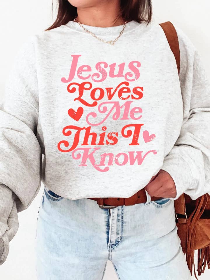Jesus Loves Me This I Know Graphic Sweatshirt
for wholesale by Wilde and Ink Threads