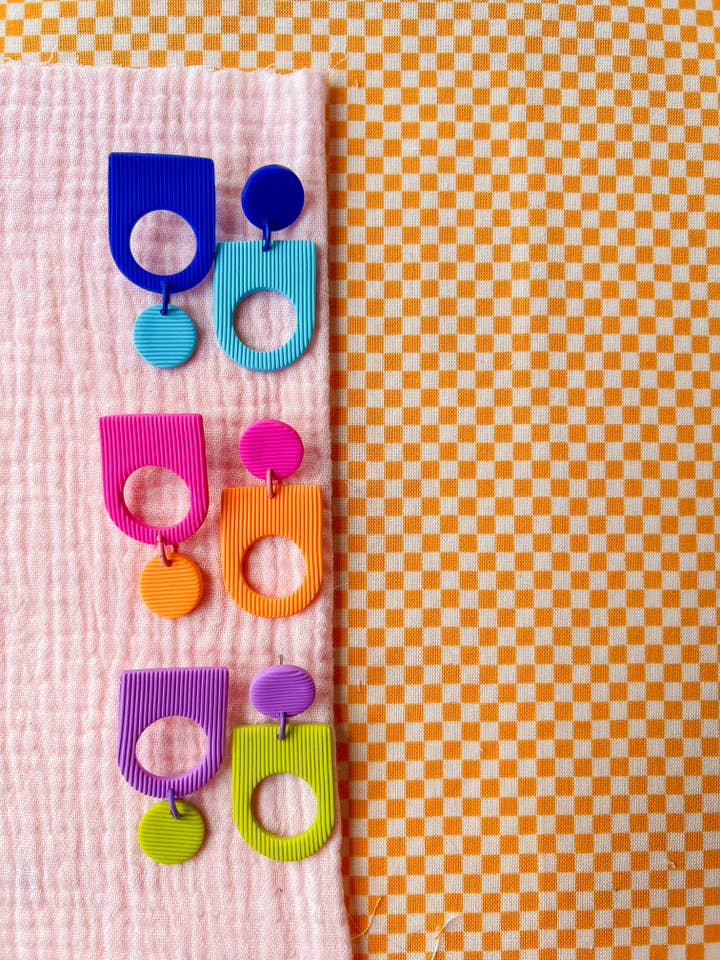 Mac | Lerörhängen för wholesale av Eleven + Jane